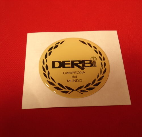 ADHESIVO DERBI CRUDO EN RESINA DE 49 MM DIAMETRO